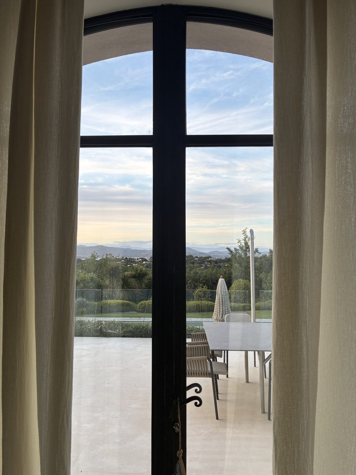 Morning light through a stone arch window