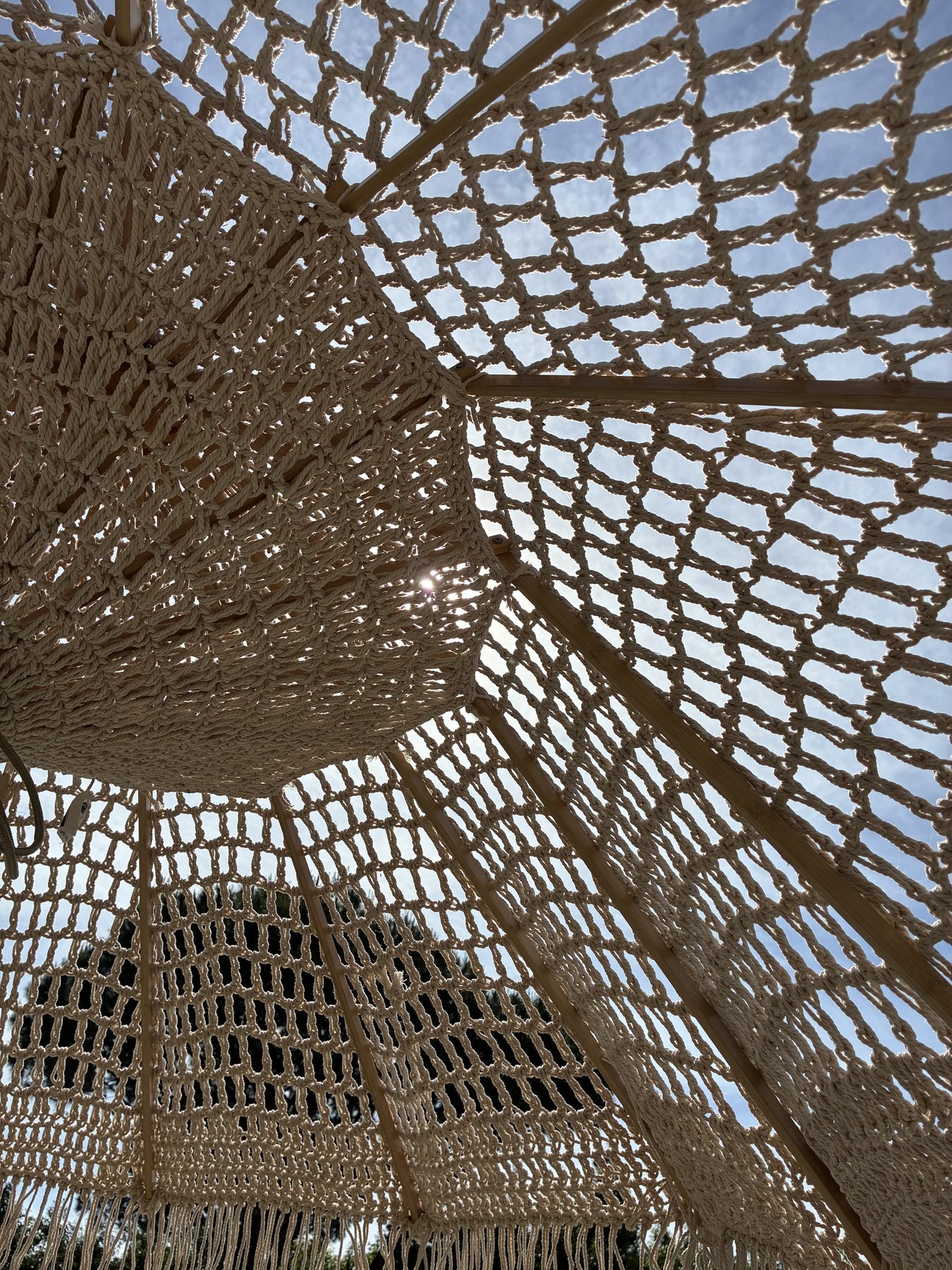Under the woven shade