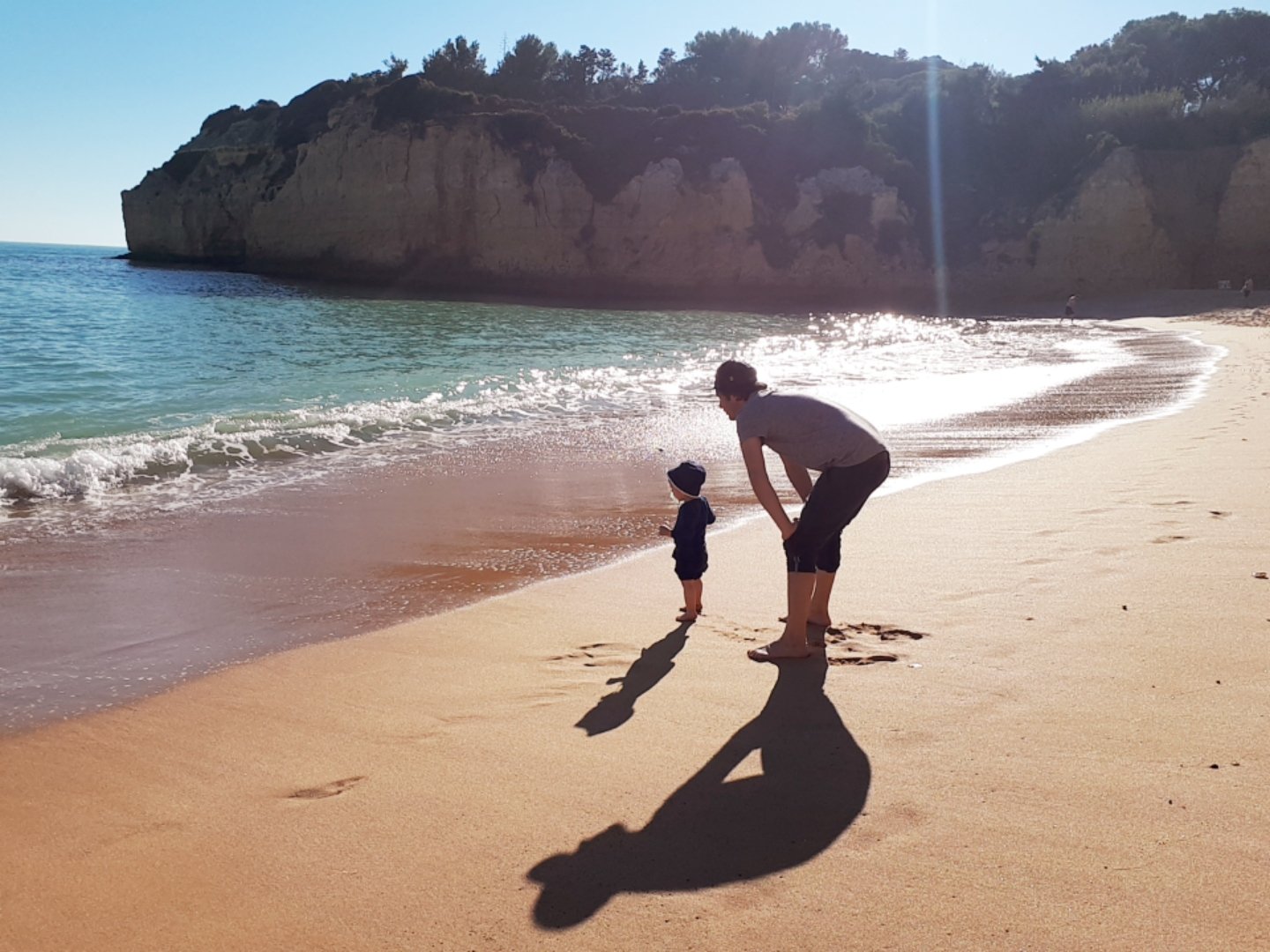 Family silhouettes on the Algarve beach, Vila Vita Parc